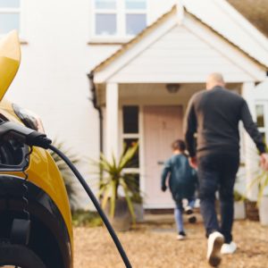 electric-car-charging-on-driveway-outside-home-wit-2023-03-24-21-22-34-utc