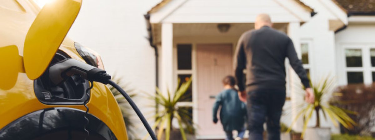 electric-car-charging-on-driveway-outside-home-wit-2023-03-24-21-22-34-utc