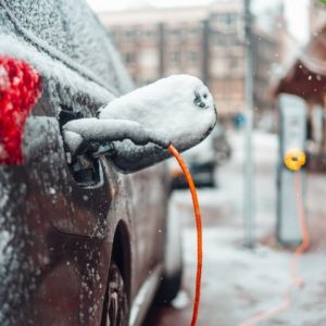 electric-car-plug-charging-in-the-winter-2021-08-26-17-18-58-utc