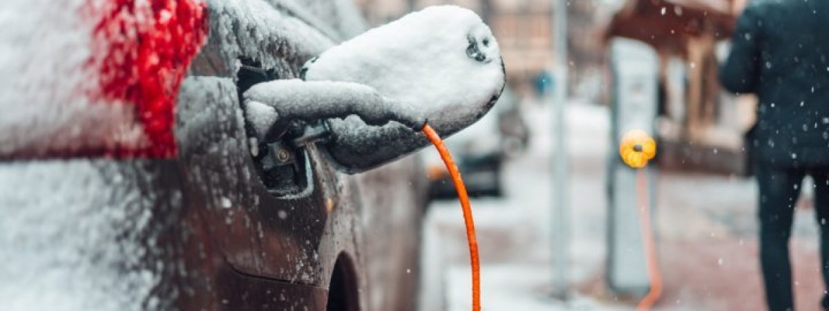 electric-car-plug-charging-in-the-winter-2021-08-26-17-18-58-utc