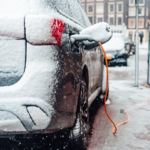 electric-car-plug-charging-in-the-winter-2021-08-26-17-19-02-utc